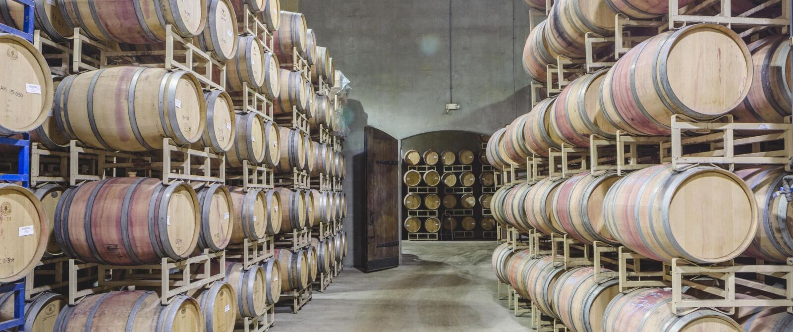 Barrels stacked high in the barrel room