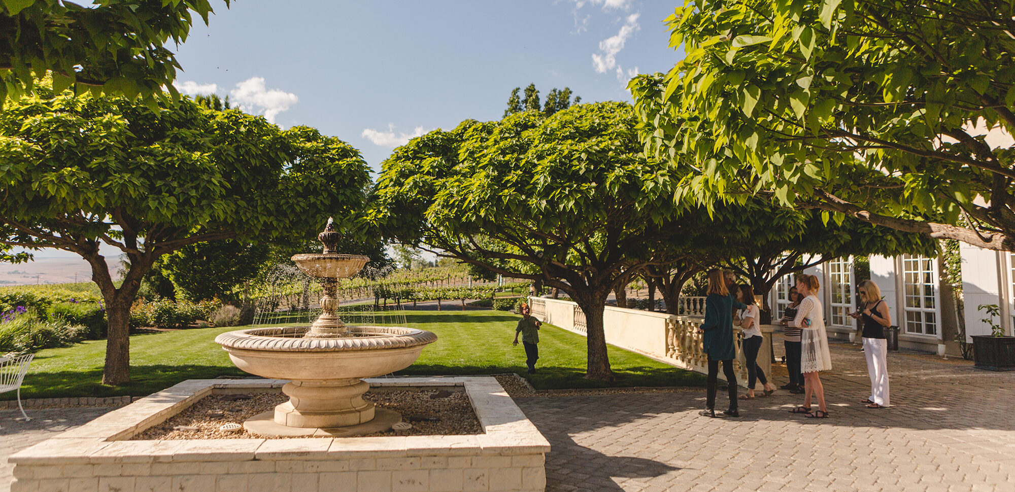 The fountain and front lawn of the tasting room